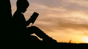 Child reading a book
